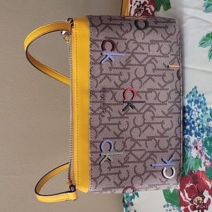 Calvin Klein it's 7in by 10 1/2in